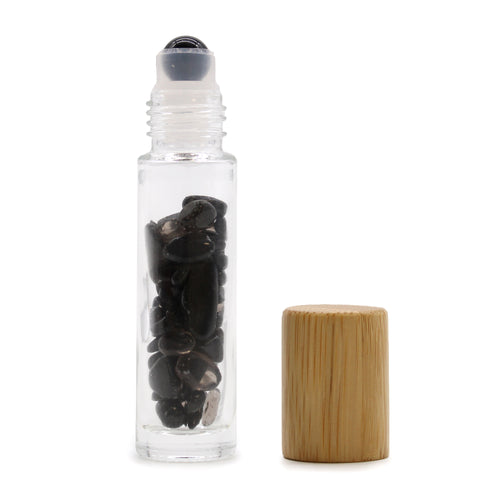 Black Tourmaline Crystal Essential Oil Roller Bottle. The roll-on bottle allows the oils to be applied precisely and easily to the skin. The ball is made of smoothly polished Black Tourmaline. The stones placed inside provide a unique visual effect, it is also believed that they enhance the effect of the given mixture. Try adding one of these essential oil blends to it.