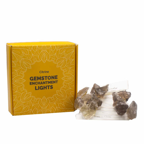 Smoky Citrine Crystal Lights.  Radiate positivity with Smoky Citrine lights. This sun-kissed gemstone exudes a cheerful, uplifting radiance that fosters abundance, success, and joy. Illuminate your surroundings with the vibrant energy of optimism and motivation.  Alluminate any area with crystal LED light strings, featuring 20 crystal rocks that emit a warm, inviting glow, ideal for creating a snug ambience in your bedroom, living room, or any indoor space.  
