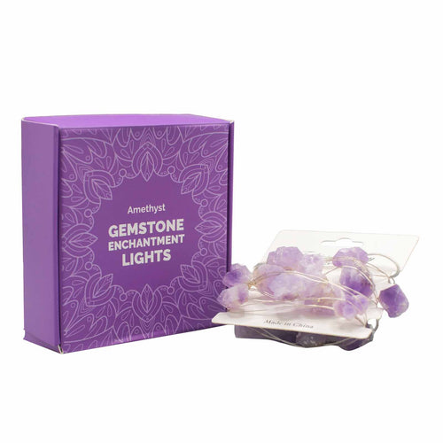 Amethyst Crystal Lights.  Evoke serenity and nurture spiritual growth with Amethyst lights. Their soothing purple radiance fosters relaxation, intuition, and inner peace. Transform your space into a tranquil haven with these enchanting lights.  Alluminate any area with crystal LED light strings, featuring 20 crystal rocks that emit a warm, inviting glow, ideal for creating a snug ambience in your bedroom, living room, or any indoor space.  