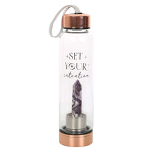 Load image into Gallery viewer, Amethyst Set You Intention Glass Water Bottle. Amplify your inner power with the claimed health benefits of crystals with this amethyst-infused glass water bottle with trendy &#39;Set your intentions&#39; text.  Thsi bottle features a natural crystal point on a screw-off stainless steel base for easy cleaning, a rubberised anti-slip bottom, and a stainless steel screw lid with loop strap.