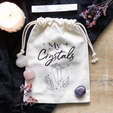 Load image into Gallery viewer, Cotton Crystal Bag. Keep crystals and tumblestones safe and tidy with this cotton drawstring storage bag. Features a sparking crystal design and &#39;My Crystals&#39; text that&#39;s a must-have for any witch.   Measures 20cm x 15cm x 1cm.