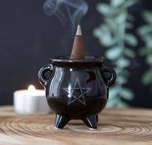 Pentagram Cauldron Ceramic Holder.  Whether used with incense sticks or cones, this ceramic cauldron incense holder makes a quirky gift for any witch.  A printed pentagram design finishes off this unique design.