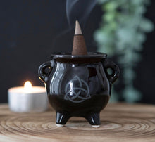 Load image into Gallery viewer, Triquetra Cauldron Ceramic Holder.  Whether used with incense sticks or cones, this ceramic cauldron incense holder makes a quirky gift for any witch.  A printed triquetra design finishes off this unique design.