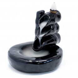Bamboo & Pool Back Flow Incense Burner.  This ceramic backflow incense burner is specially designed to create smoke that cascades downwards, pouring dramatically down the tower with a stunning effect.  Once you have lit your incense cone, it will begin to smoke, the incense is heavier than air and it will fall dramatically in swirls and twists, through the hole and down over the item, to pool at the bottom. It is incredible to watch and very relaxing. 